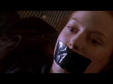 Alicia Witt tape gagged in bondage