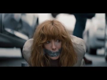 Kelly Reilly tape gagged in bondage