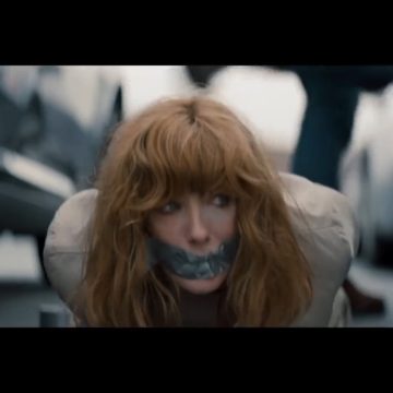 Kelly Reilly tape gagged in bondage