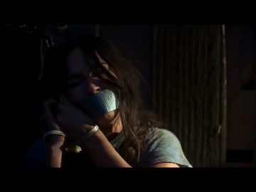 Megan Fox tape gagged in bondage
