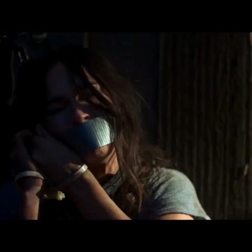 Megan Fox tape gagged in bondage